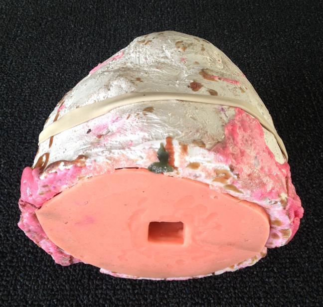 Seth David Friedman, Untitled, 2015, plaster and silicone held together with a rubber band, 7.5 x 6 x 7 inches.